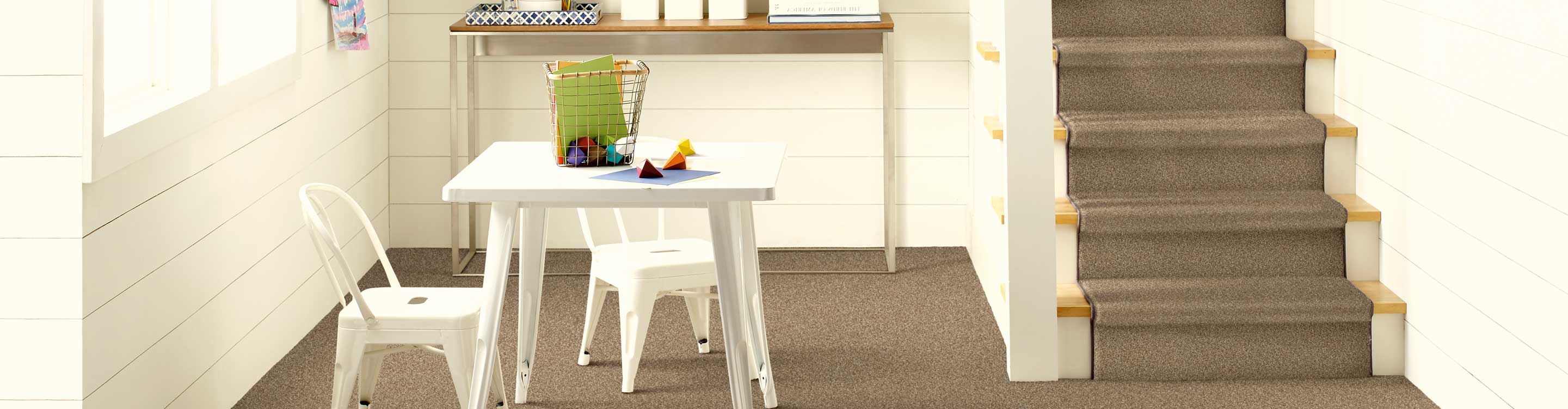 brown neutral carpet stair runner in living area and kids playroom