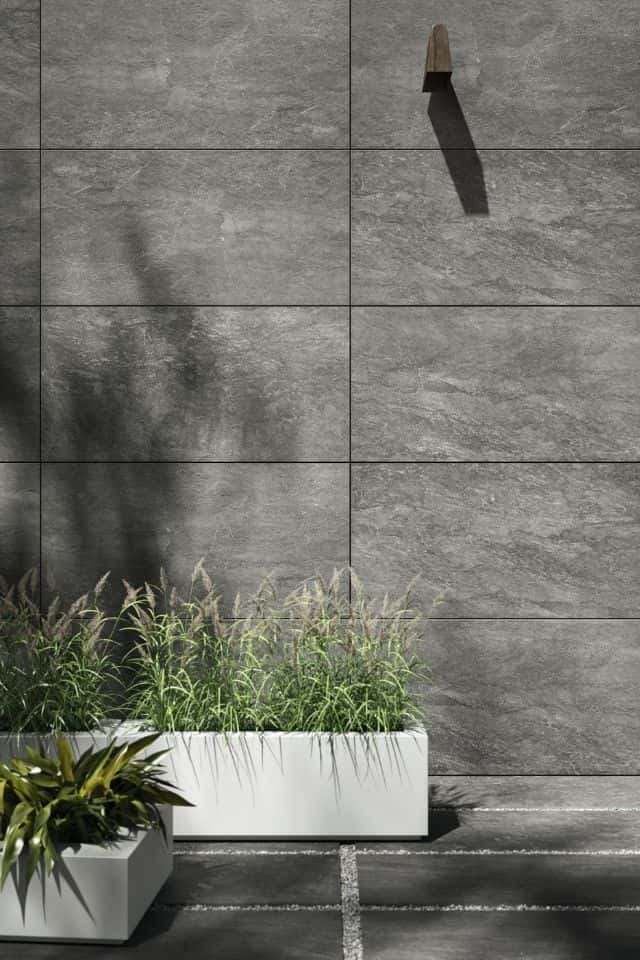 Consulate by Daltile oversized gray tiles on exterior wall